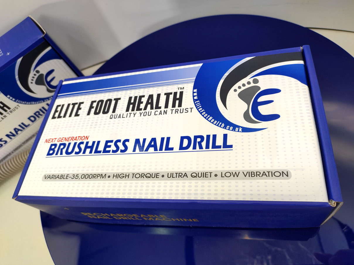Picture shows Onyx nail drill box showcasing quiet, low vibration 35 000 rpm motor—premium podiatry instruments and chiropodist equipment for sale by leading foot care suppliers. Background is blue, box is blue and white, with blue and grey writing on.