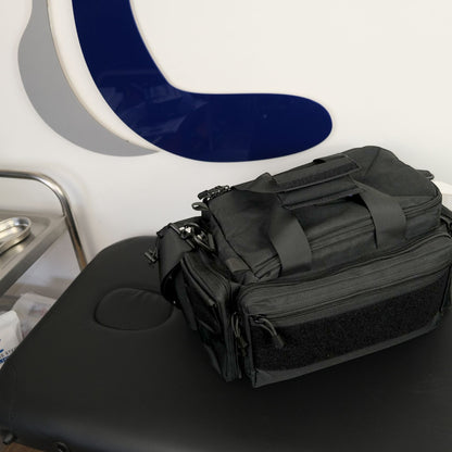 Black tactical bag on a chair with a blue cushion