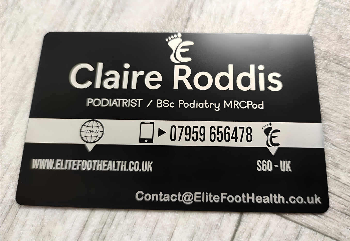laser engraved black metal business card